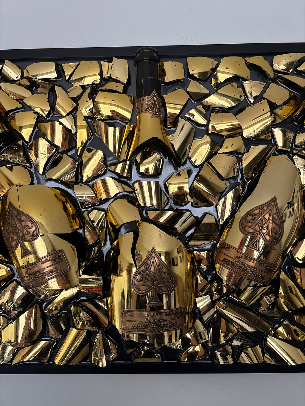 The Triple Armand De Brignac